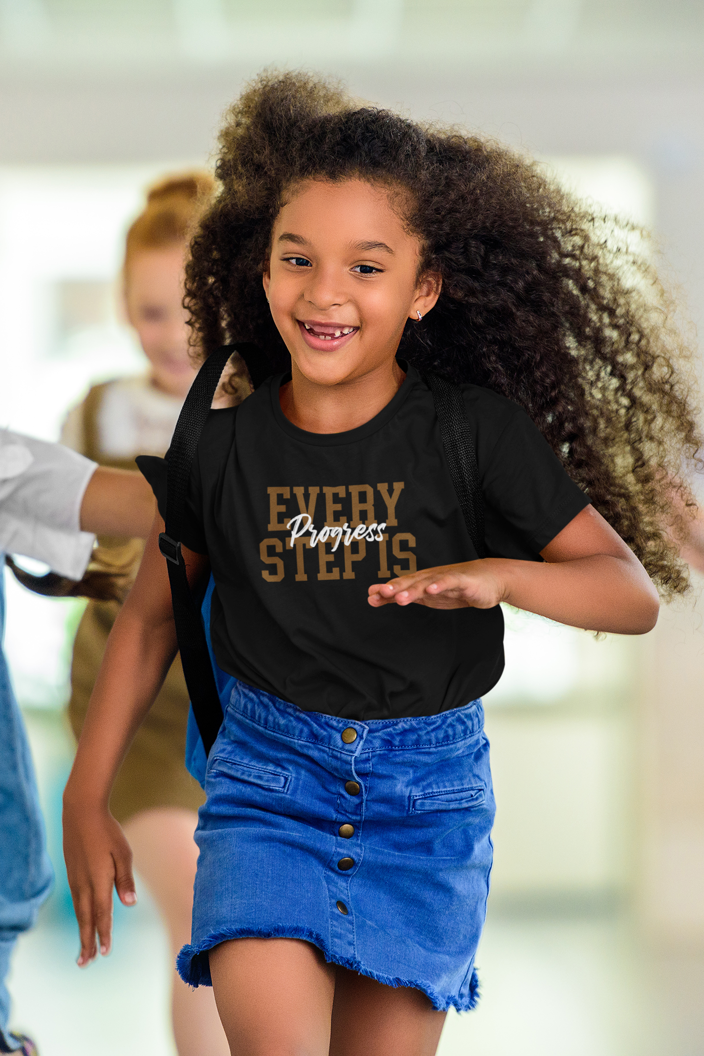 A girl wearing a Every Step is Progress Tee (Youth Size) from Sharp Tact Kreativ | Tees & Gifts with Encouraging Messages to Brighten Your Day with a Bit of Wit, that says every girl is special.