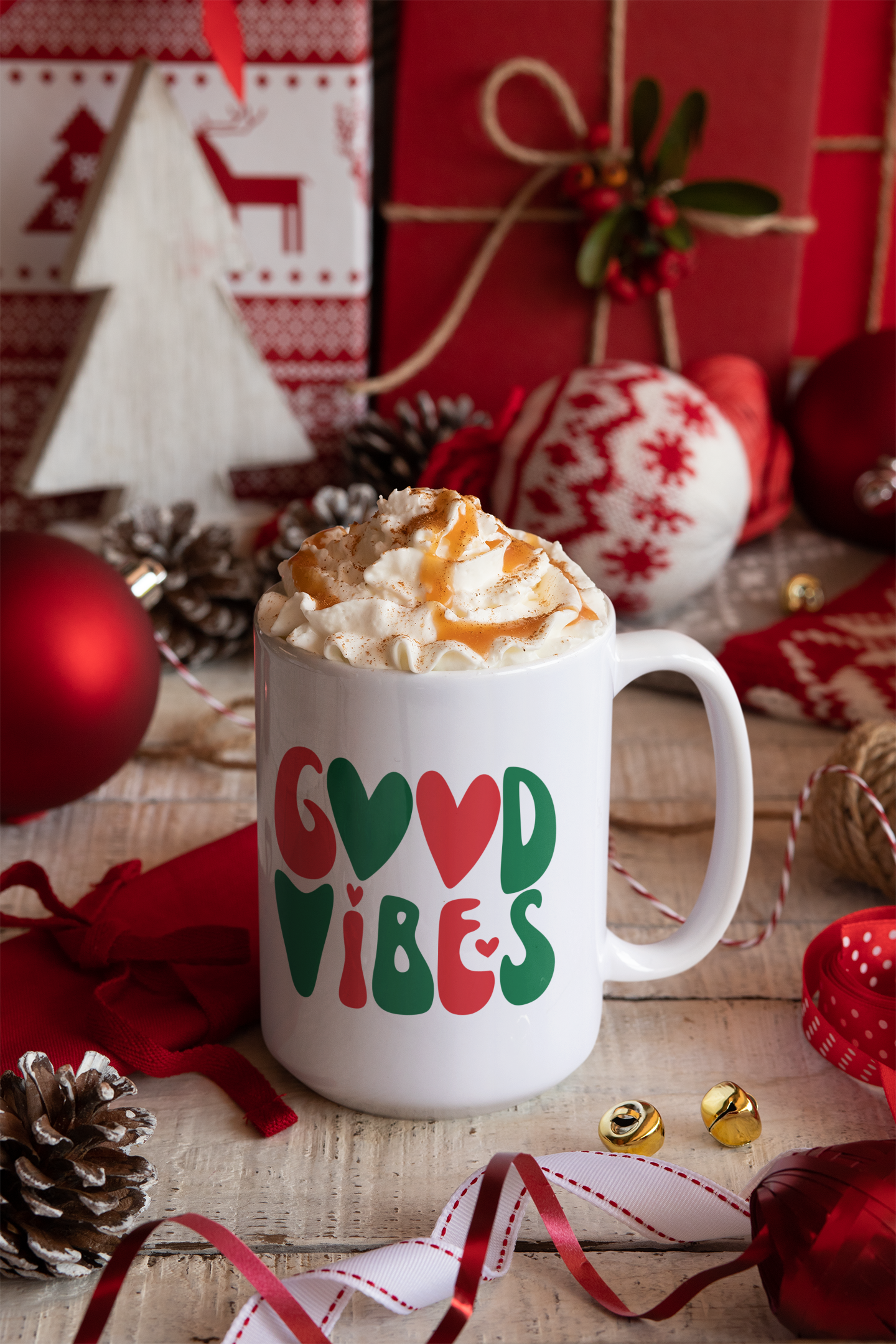 A Sharp Tact Kreativ coffee mug with the words "Good Vibes" on it, perfect to pair with a cozy long-sleeve tee, or as part of a Good Vibes Holiday Bundle.