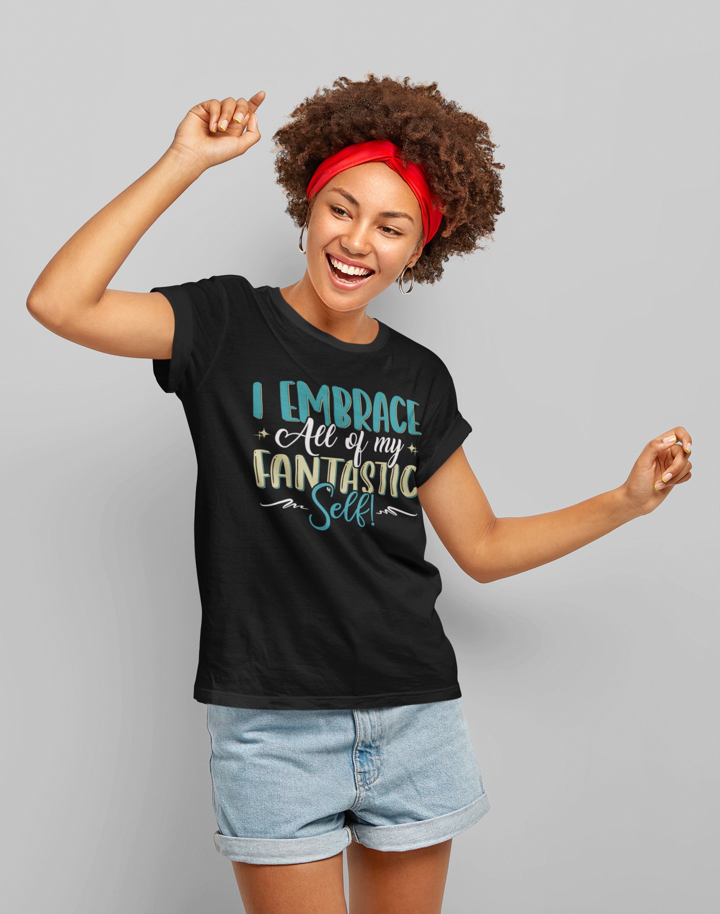 A woman wearing a black t-shirt that says "I Embrace All of My Fantastic Self" by Sharp Tact Kreativ | Tees & Gifts with Encouraging Messages to Brighten Your Day with a Bit of Wit.