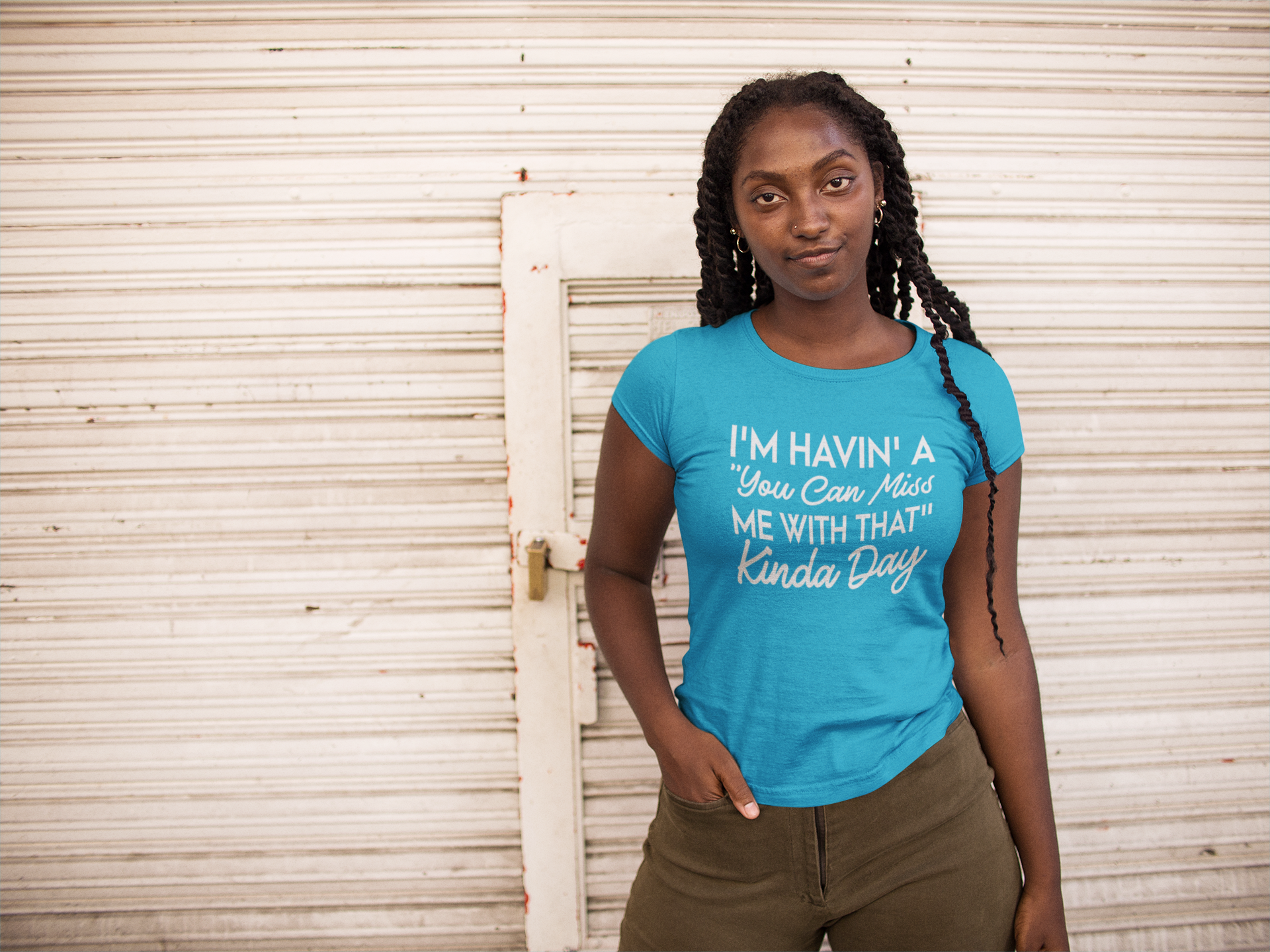 A young woman wearing a "I'm Havin' A 'You Can Miss Me With That' Kinda Day Tee" by Sharp Tact Kreativ | Tees & Gifts with Encouraging Messages to Brighten Your Day with a Bit of Wit.