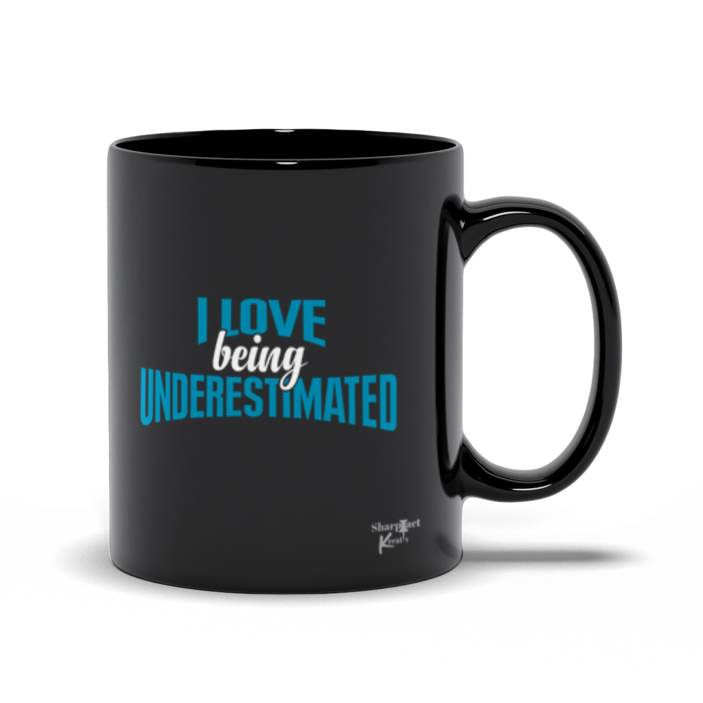 I love the Sharp Tact Kreativ | Tees & Gifts with Encouraging Messages to Brighten Your Day with a Bit of Wit I Love Being Underestimated Ceramic Mug (Black).