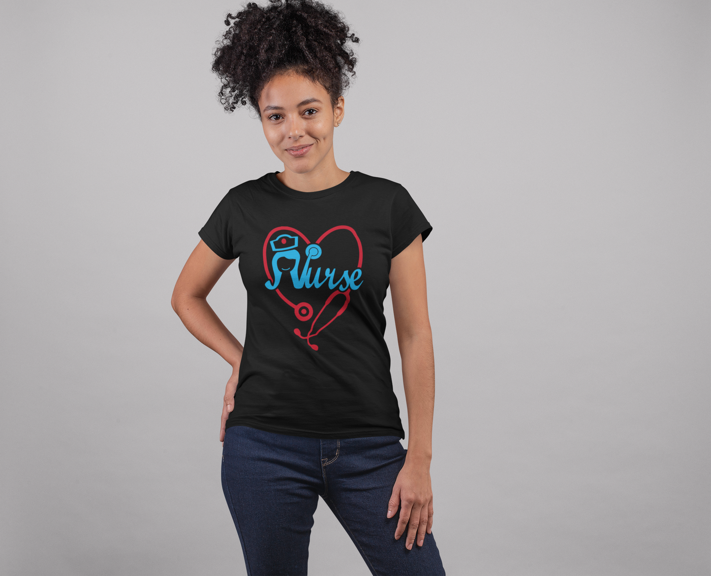 A woman wearing a Nurse (Flip) Tee by Sharp Tact Kreativ | Tees & Gifts with Encouraging Messages to Brighten Your Day with a Bit of Wit, with a heart on it.